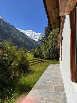 a porch of a house with a view of a mountain at Chalet La Frasse in Chamonix-Mont-Blanc