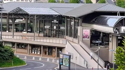 a building with a road in front of it at Appartement 14 - Résidence Conseil au coeur du village in Saint-Gervais-les-Bains
