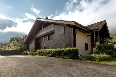 a house on the side of a road at Grande Jorasses 2 - Ski - Terrasse - Vue Montagne in Les Houches