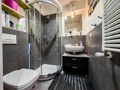 a small kitchen with a sink and a microwave at Studio 4810 Centre Chamonix in Chamonix-Mont-Blanc