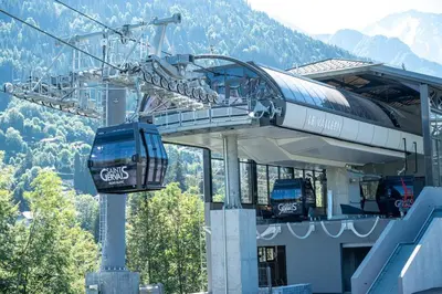 a gondola ride in a ski lift in the mountains at Grand Panorama 1 bedroom - sleeps 4, Parking, Pool, Next to Ski Lift in Saint-Gervais-les-Bains