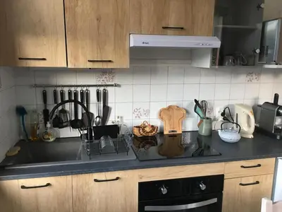 a kitchen with a sink and a counter top at La Comtesse in Saint-Gervais-les-Bains