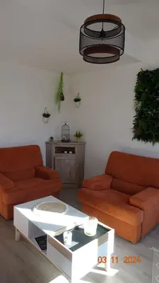 a living room with two couches and a coffee table at La Comtesse in Saint-Gervais-les-Bains