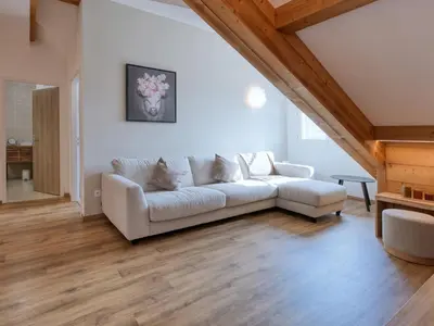 a kitchen with a table with wine glasses on it at Duplex moderne 5 pièces, 4 chambres, 10 pers., WiFi, parking, proche centre - FR-1-663-48 in Saint-Gervais-les-Bains