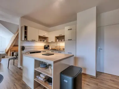 a bedroom with wooden walls and a bed in a room at Duplex moderne 5 pièces, 4 chambres, 10 pers., WiFi, parking, proche centre - FR-1-663-48 in Saint-Gervais-les-Bains