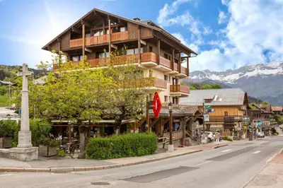 a building on the side of a street at Les Aiguilles de Warens - Combloux in Combloux