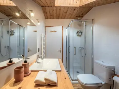 a bathroom with a sink and a shower at Chalet Tannuaz - 4 Bedrooms - Quiet area - By Cozee Rentals in Les Houches