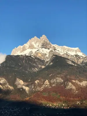 a mountain with a snow covered mountain at Gite Le sommet in Sallanches