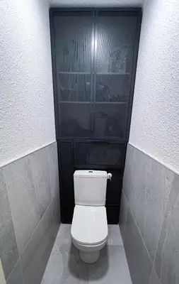 a bathroom with a white toilet in a room at 3 cows in Les Contamines-Montjoie