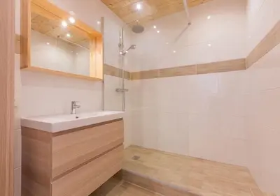 a bathroom with a sink and a shower at Résidence Le Relax - Megève Centre in Megève
