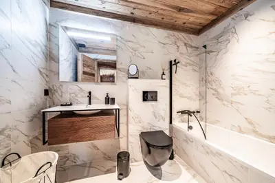 a bathroom with a sink and a shower at Apartment Brume Megève - by EMERALD STAY in Megève
