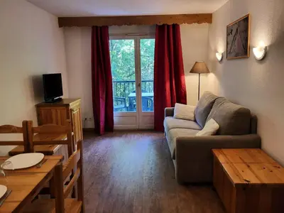 a living room with a couch and a table at Résidence Le Grand Panorama - Grand Panorama 315 MAE-0623 in Saint-Gervais-les-Bains