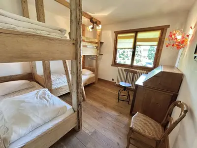 a bedroom with two bunk beds and a desk at Appartement 4 pièces, 6 couchages, balcon, parking, Megève - FR-1-597-194 in Megève