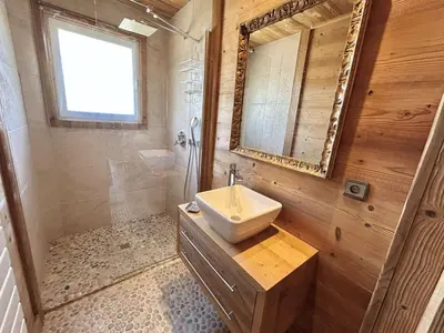 a bathroom with a sink and a mirror at Appartement 4 pièces, 6 couchages, balcon, parking, Megève - FR-1-597-194 in Megève