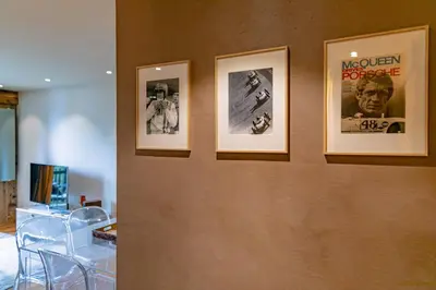 a wall with three pictures on it with at Arly in Megève