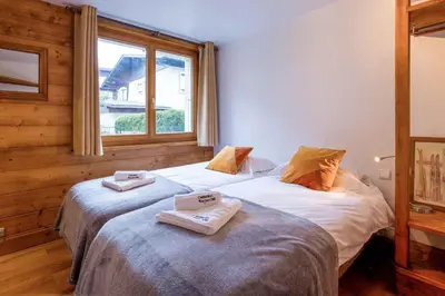 a bathroom with a sink and a mirror at Edelweiss apartment - Chamonix All Year in Chamonix-Mont-Blanc