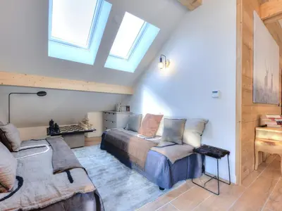 a living room with a couch and a tv at Appartement 3 pièces, 4 pers, proche centre et télécabine, WiFi - FR-1-663-51 in Saint-Gervais-les-Bains