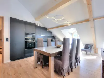 a bedroom with a bed and a wooden wall at Appartement 3 pièces, 4 pers, proche centre et télécabine, WiFi - FR-1-663-51 in Saint-Gervais-les-Bains