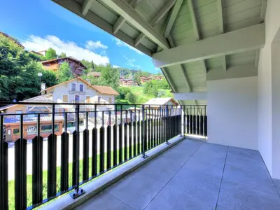 a dining room with a table and chairs at 3 pièces avec balcon, proche centre et télécabine, animaux admis - FR-1-663-50 in Saint-Gervais-les-Bains