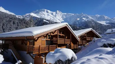 a log cabin with snow on the roof at Contamines-Monjoie in Les Contamines-Montjoie