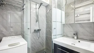 a bathroom with a shower and a sink and a toilet at Grand Horizon 1 N204 - 2P4 in Morillon