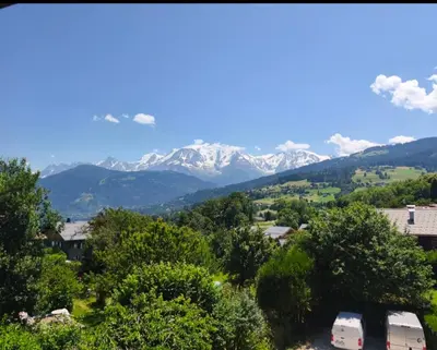 a view of the mountains from a house at Accommodation of 167 m2 with views of Mont Blanc in Combloux