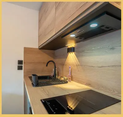 a kitchen with a sink and a counter top at Studio La Piste Verte I Saint-Gervais in Saint-Gervais-les-Bains