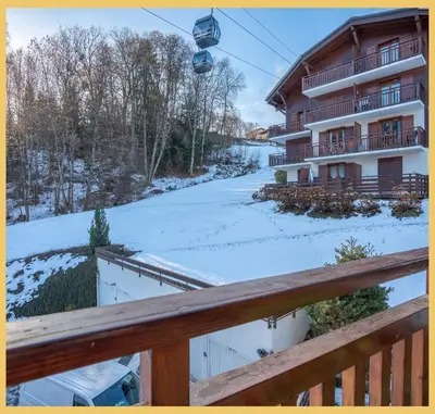 a view from the balcony of a ski lodge at Studio La Piste Verte I Saint-Gervais in Saint-Gervais-les-Bains