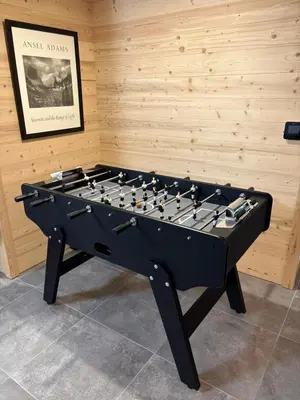 a black pool table in a room at Kayla du Mont-Blanc - Espace bien etre - Piscine in Les Houches