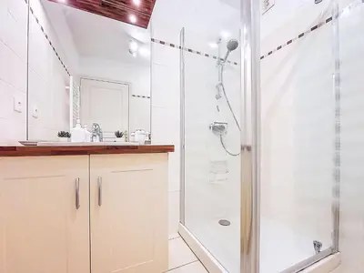 a bathroom with a shower and a sink at Apartment Domaine de Crespin-6 by Interhome in Saint-Gervais-les-Bains