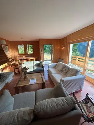 a living room with couches and a table at Carpe Diem in Sixt