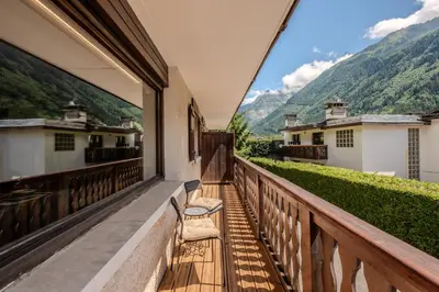 a balcony with a view of the mountains at Apartment Grand Payot, Alpes Travel, Sleeps 2 to 4 in Chamonix-Mont-Blanc