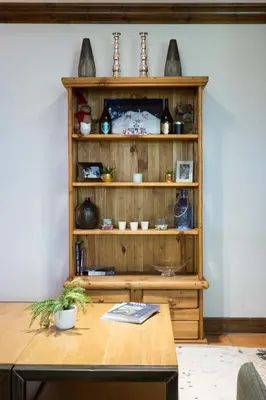 a wooden shelf with various items on it at Pothecary apartment -Chamonix All Year in Chamonix-Mont-Blanc