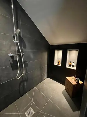 a bathroom with a shower and a sink at Duplex MontBlanc - Suite, Centre & Parking by AlpenlySallanches in Sallanches