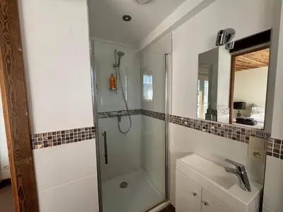 a bathroom with a shower and a sink at Beautiful chalet with panoramic views in Samoens walking distance to the village in Samoëns