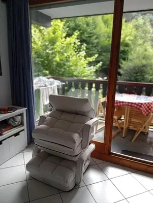 a kitchen with white cabinets and a washer and dryer at Le bel alp- Coeur de montagne en centre ville in Saint-Gervais-les-Bains