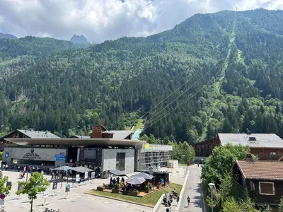 a view of a town with a mountain in the background at Apartment l'Aiguille, au pied des télécabines in Chamonix-Mont-Blanc