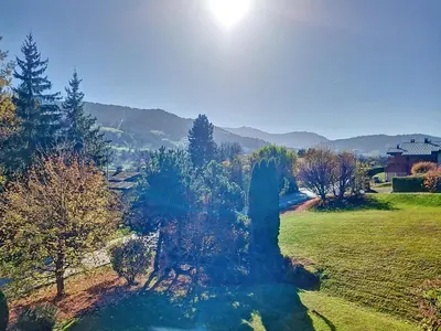 an aerial view of a waterfall in a field at Duplex 2 pièces avec balcon et Wifi face au Mont Blanc - FR-1-560-165 in Combloux