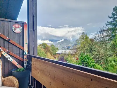 a balcony with a view of a mountain at Duplex 2 pièces avec balcon et Wifi face au Mont Blanc - FR-1-560-165 in Combloux