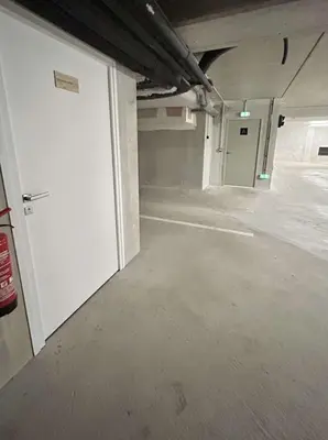 an empty room with a white door in a garage at Appartement 3 Pièces, 4-6 couchages, COMBLOUX COM100-A402 in Combloux