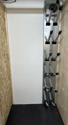 a room with a white garage door with wine racks at Appartement 3 Pièces, 4-6 couchages, COMBLOUX COM100-A402 in Combloux