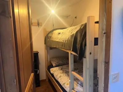 a couple of bunk beds in a room at Résidence Les Crocus - Crocus 3 MAE-5013 in Mémontel