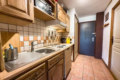 a kitchen with a sink and a counter top at Stay in the heart of Chamonix close to the slopes in Chamonix-Mont-Blanc