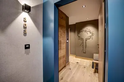 two views of a hallway in a house at Residence Blanc Mont Blanc in Chamonix-Mont-Blanc