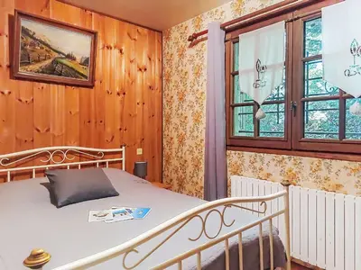 a bathroom with a sink and a mirror and a shower at Apartment Chalet le Prarion by Interhome in Saint-Gervais-les-Bains