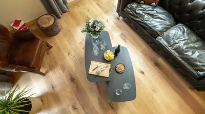 an overhead view of a coffee table in a living room at Enjoy Chalet in Chamonix-Mont-Blanc