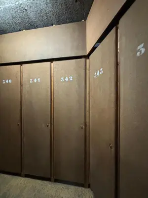 a row of metal lockers in a locker room at Au nid du Lay in Les Contamines-Montjoie