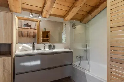a bathroom with a sink and a shower at Chalet Mont Blanc in Cordon