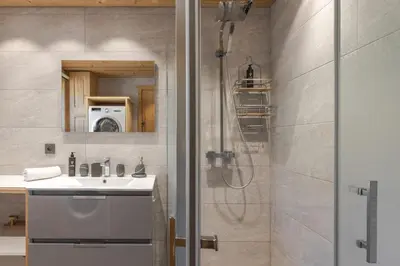 a bathroom with a sink and a shower at Chalet Mont Blanc in Cordon