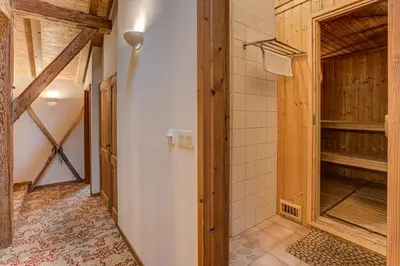 a bathroom with a walk in shower and a walk in closet at Chalet Pele - Alpes Travel - Sleeps 11 in Chamonix-Mont-Blanc